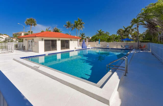 view of swimming pool featuring a patio