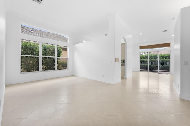 7234 Vesuvio Pl, Boynton Beach, FL 33437 - unfurnished room featuring arched walkways, visible vents, baseboards, recessed lighting, and light tile patterned floors