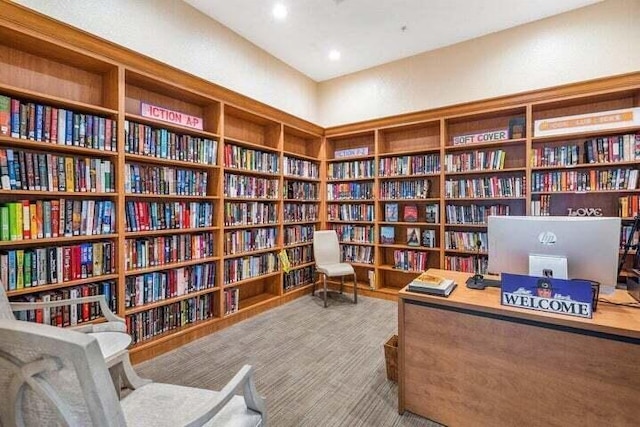 7234 Vesuvio Pl, Boynton Beach, FL 33437 - sitting room with wall of books and built in shelves