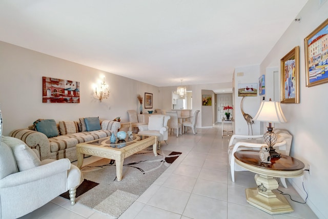 tiled living room featuring an inviting chandelier