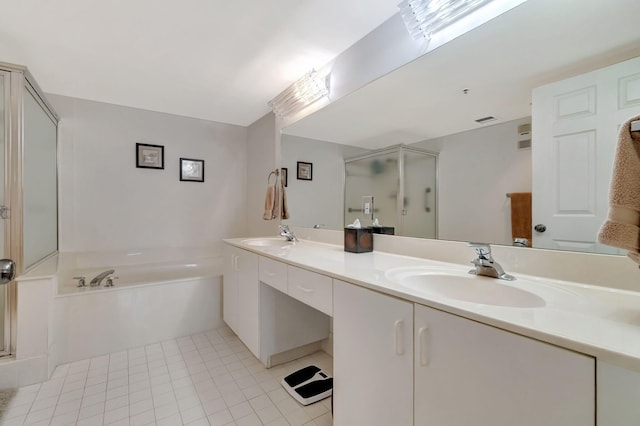 bathroom with tile patterned flooring, plus walk in shower, and vanity