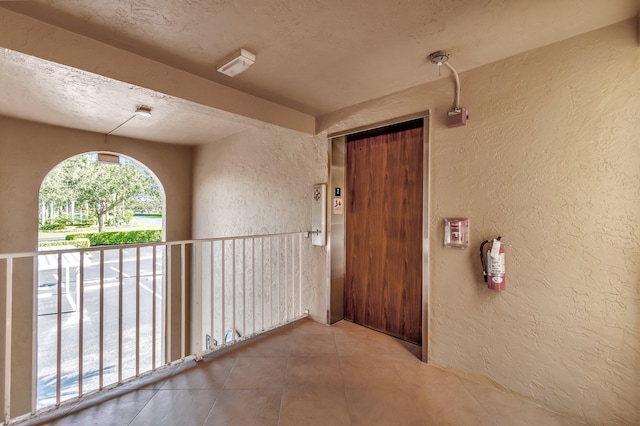 doorway to property featuring elevator