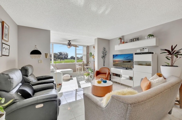 1480 NW 80th Ave Unit 201, Margate, FL 33063 - living area featuring a textured ceiling and ceiling fan