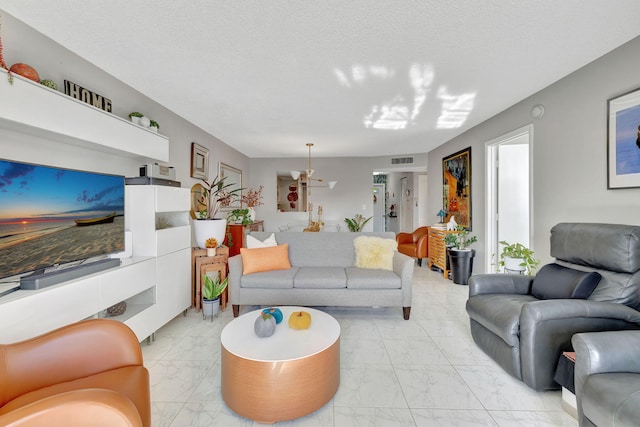 living room featuring a textured ceiling