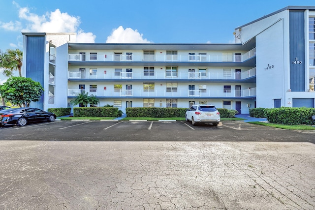 1480 NW 80th Ave Unit 201, Margate, FL 33063 - view of apartment building / complex featuring uncovered parking