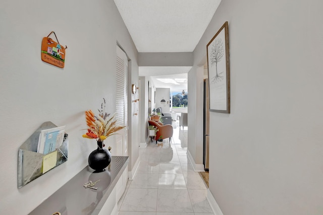 1480 NW 80th Ave Unit 201, Margate, FL 33063 - hallway with light marble finish floors and baseboards
