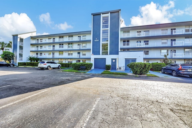 1480 NW 80th Ave Unit 201, Margate, FL 33063 - view of apartment building / complex with uncovered parking