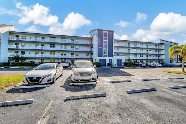 1480 NW 80th Ave Unit 201, Margate, FL 33063 - view of apartment building / complex featuring uncovered parking