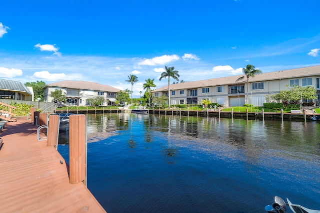 dock area with a water view