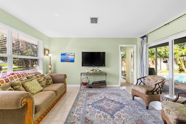 living room with light tile patterned floors