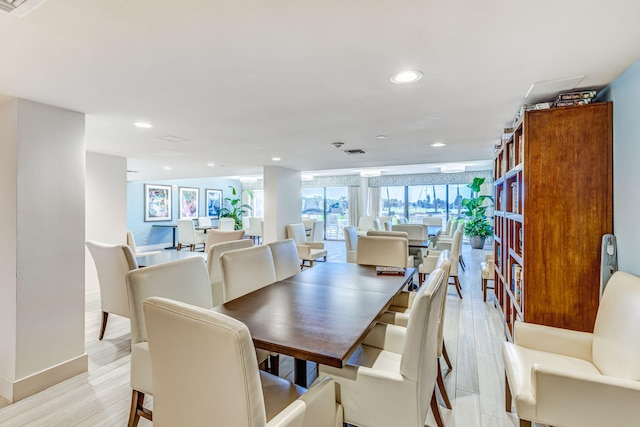 dining room featuring light hardwood / wood-style flooring