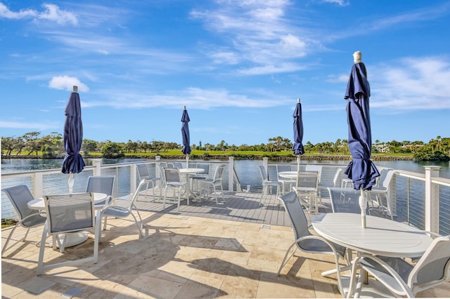 view of patio / terrace with a water view