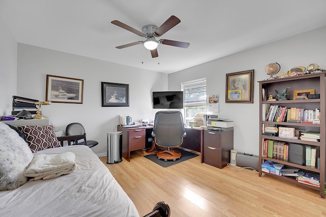 bedroom with ceiling fan and light hardwood / wood-style flooring