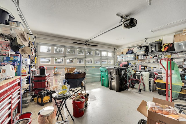 garage featuring a garage door opener