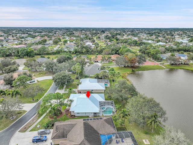 drone / aerial view with a water view