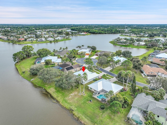 drone / aerial view with a water view