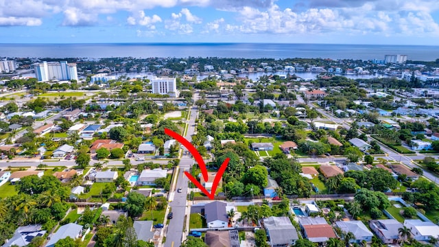 drone / aerial view featuring a water view