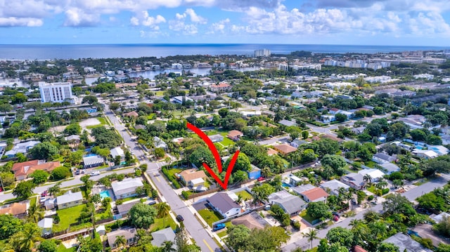 aerial view featuring a water view