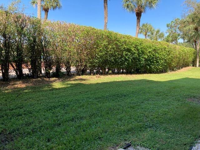 2811 Village Blvd Unit 106, West Palm Beach, FL 33409 - view of grassy yard