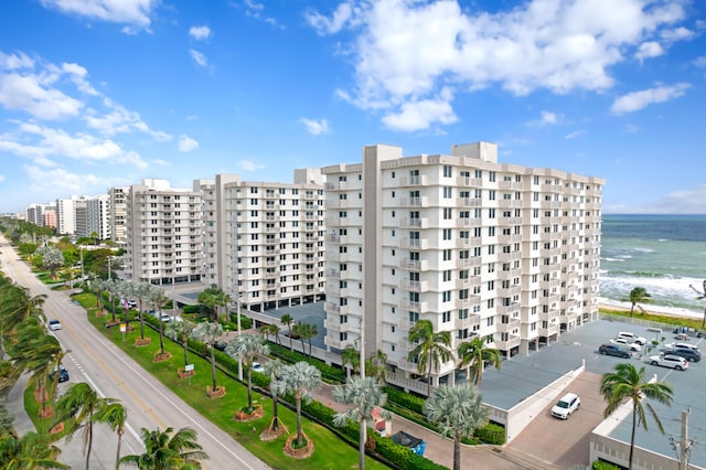 view of building exterior with a water view