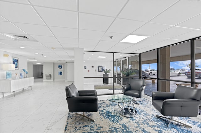 3301 S Ocean Blvd Unit 405, Highland Beach, FL 33487 - building lobby featuring a drop ceiling and floor to ceiling windows