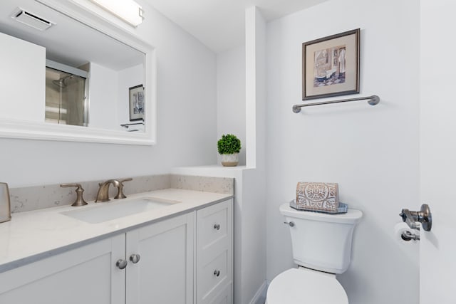 3301 S Ocean Blvd Unit 405, Highland Beach, FL 33487 - bathroom with vanity and toilet