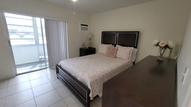 tiled bedroom featuring access to outside and a wall unit AC