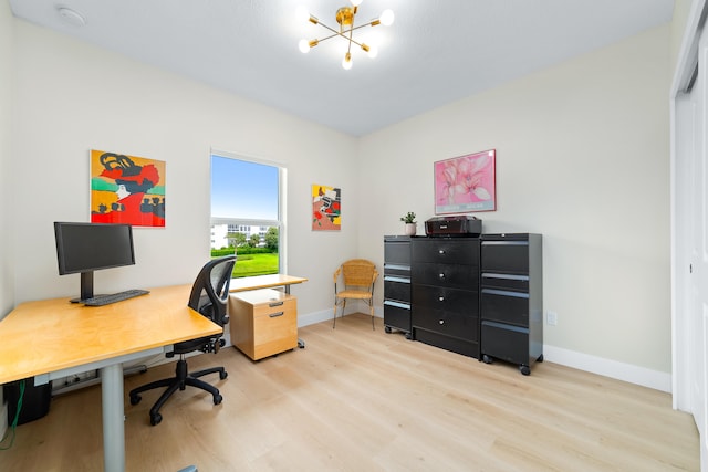 office area featuring light hardwood / wood-style flooring and a notable chandelier