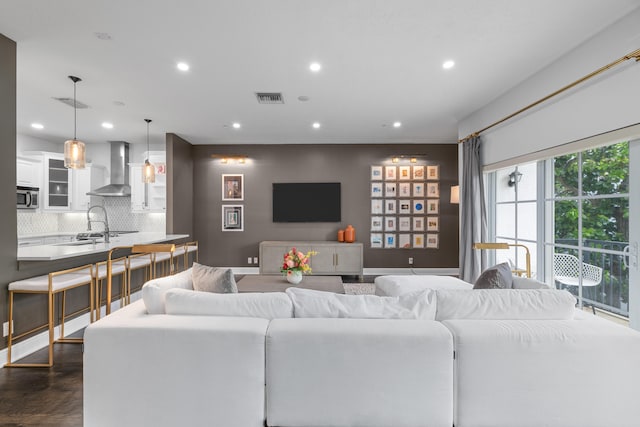 living room featuring dark hardwood / wood-style flooring