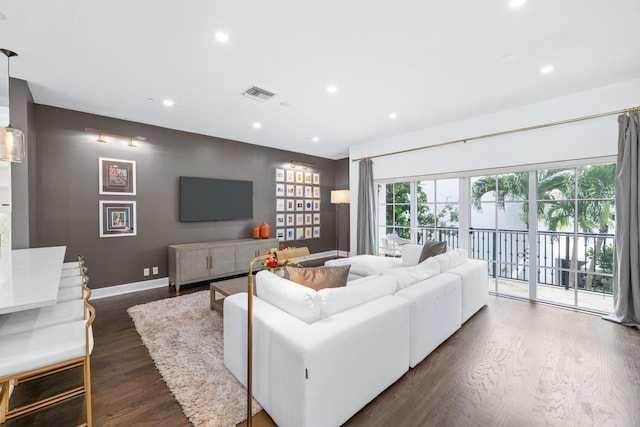 living room featuring dark hardwood / wood-style flooring