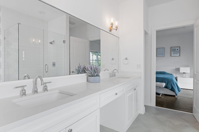 bathroom with walk in shower, hardwood / wood-style flooring, and vanity