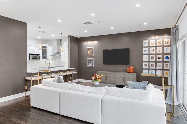 living room featuring dark hardwood / wood-style floors