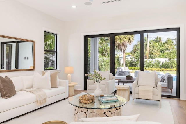 living room with light hardwood / wood-style floors