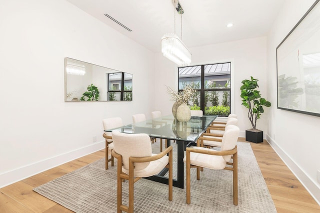 dining room with light hardwood / wood-style floors