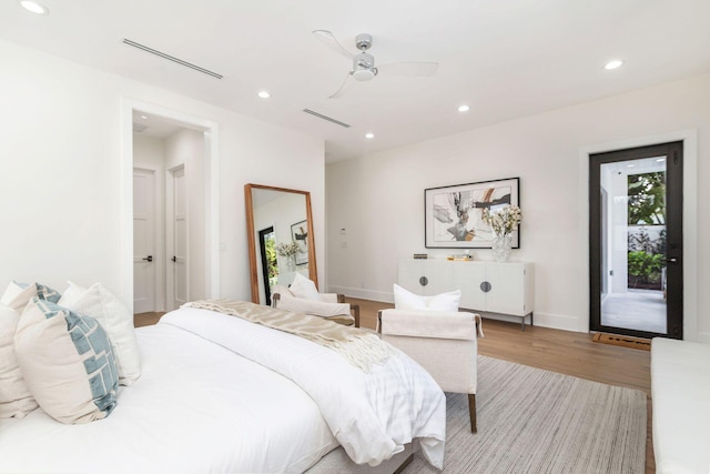 bedroom with access to outside, ceiling fan, and light wood-type flooring