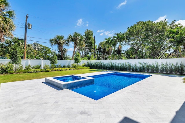 view of swimming pool with an in ground hot tub and a patio