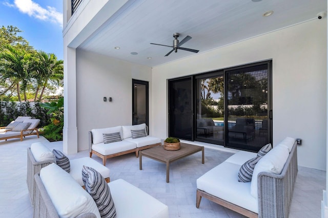 view of patio featuring outdoor lounge area and ceiling fan