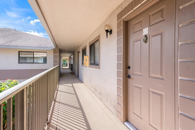 entrance to property featuring a balcony