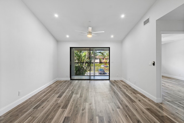 unfurnished room featuring ceiling fan and light hardwood / wood-style floors