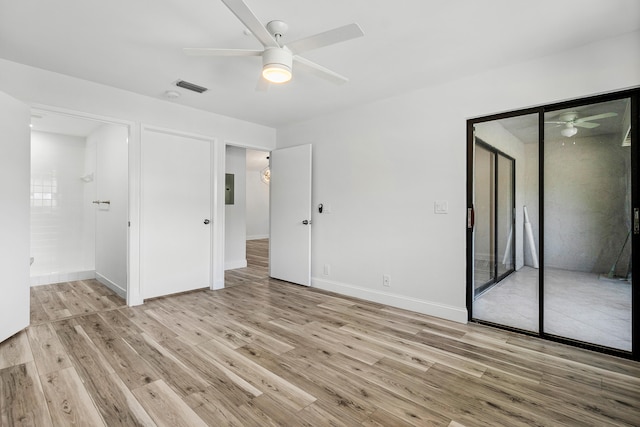 unfurnished bedroom featuring ceiling fan and light hardwood / wood-style floors