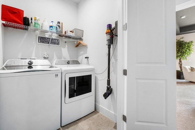 clothes washing area with independent washer and dryer