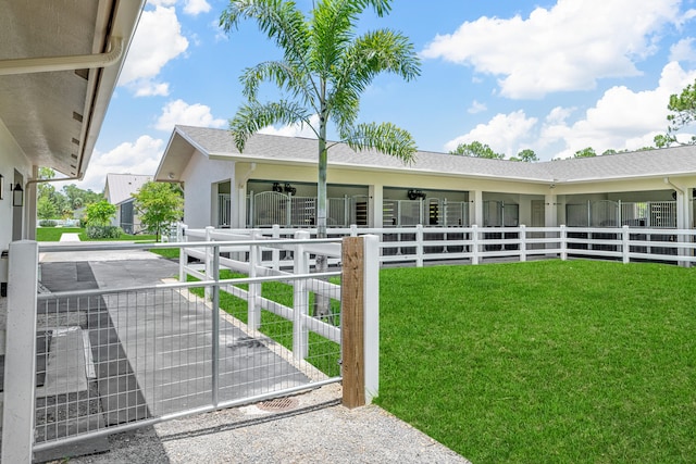 exterior space with a front yard and a patio