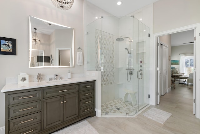 1464 Stallion Dr, Loxahatchee, FL 33470 - bathroom featuring vanity, a shower stall, a chandelier, and ensuite bathroom