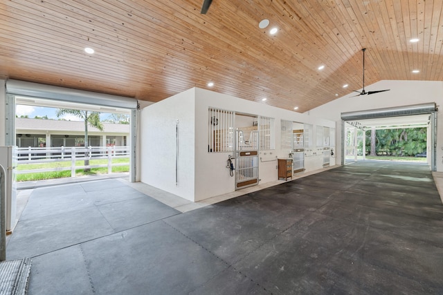 interior space featuring wood ceiling and ceiling fan