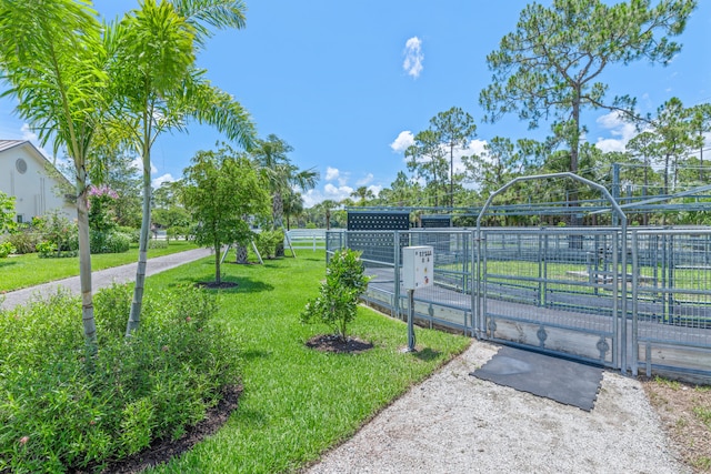 surrounding community featuring a lawn