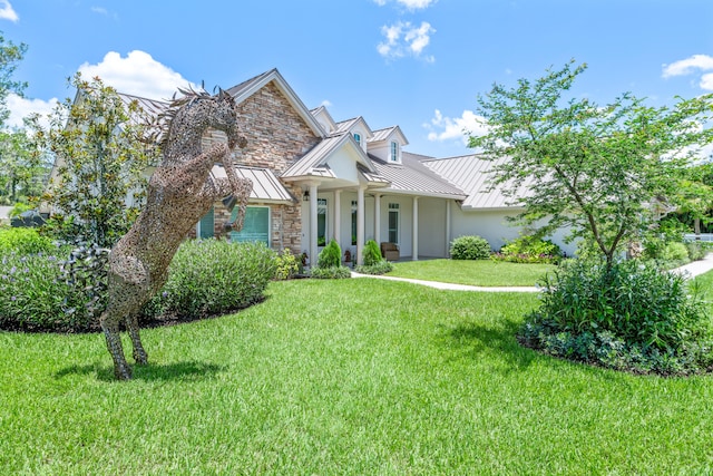 view of front of property with a front lawn