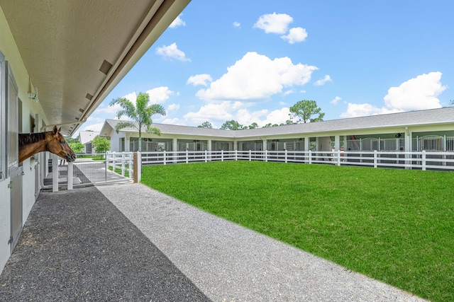 1464 Stallion Dr, Loxahatchee, FL 33470 - view of yard featuring an exterior structure