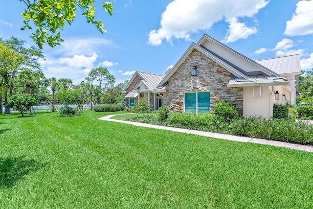 exterior space with a front lawn