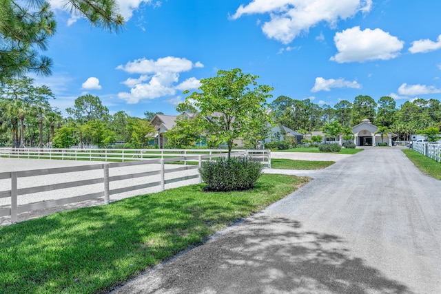 1464 Stallion Dr, Loxahatchee, FL 33470 - view of asphalt driveway