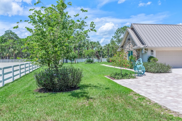 1464 Stallion Dr, Loxahatchee, FL 33470 - view of yard with a garage and driveway